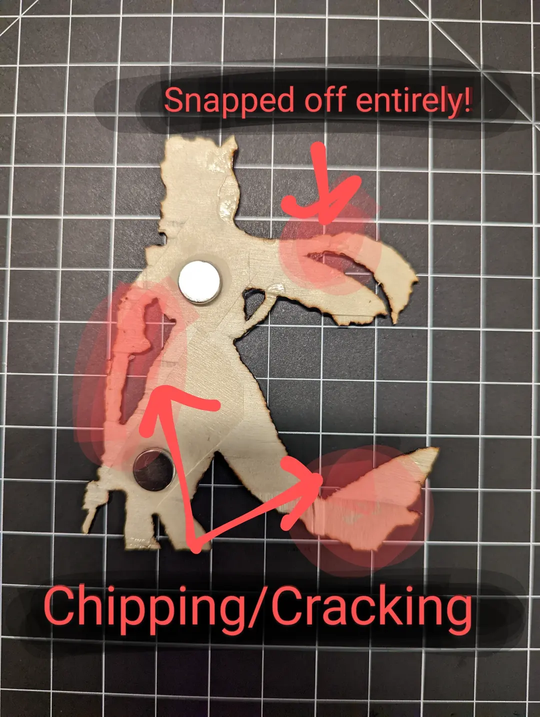 Image showing faults with cutting out the art including cracking and chipping.