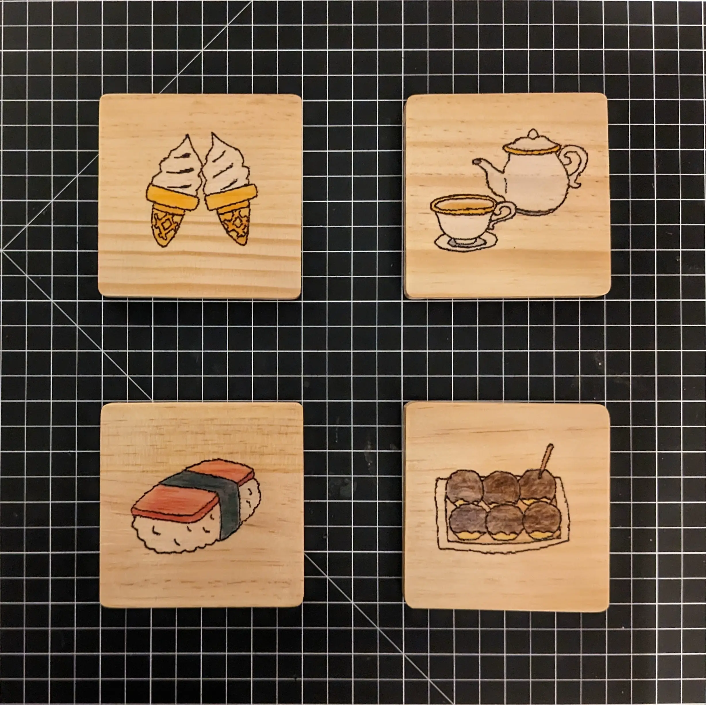 Image showing the coasters after being colored and varnished.