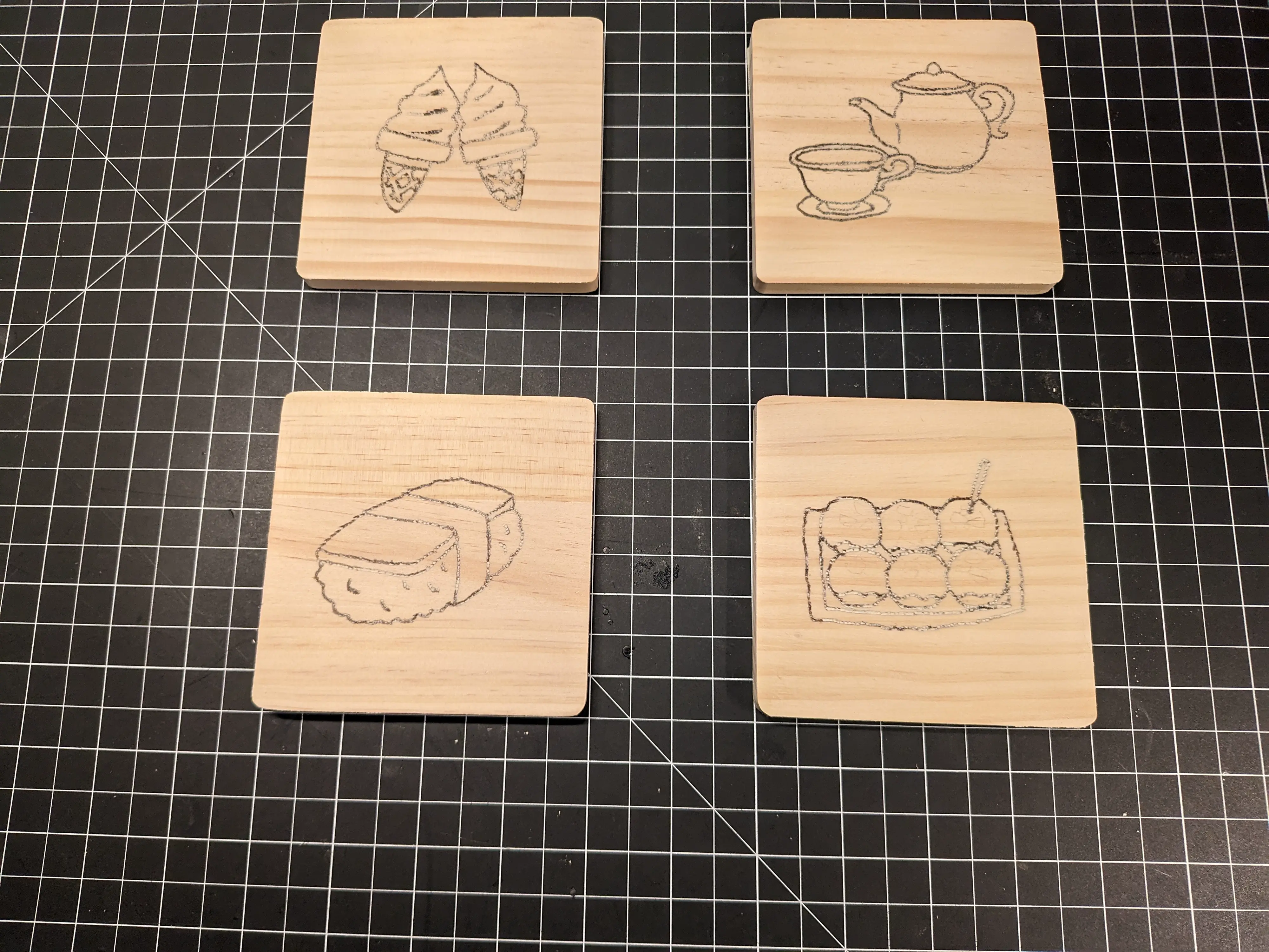 Image showing sanded wood coasters. The previously dark lines have been filled in with fine sawdust.